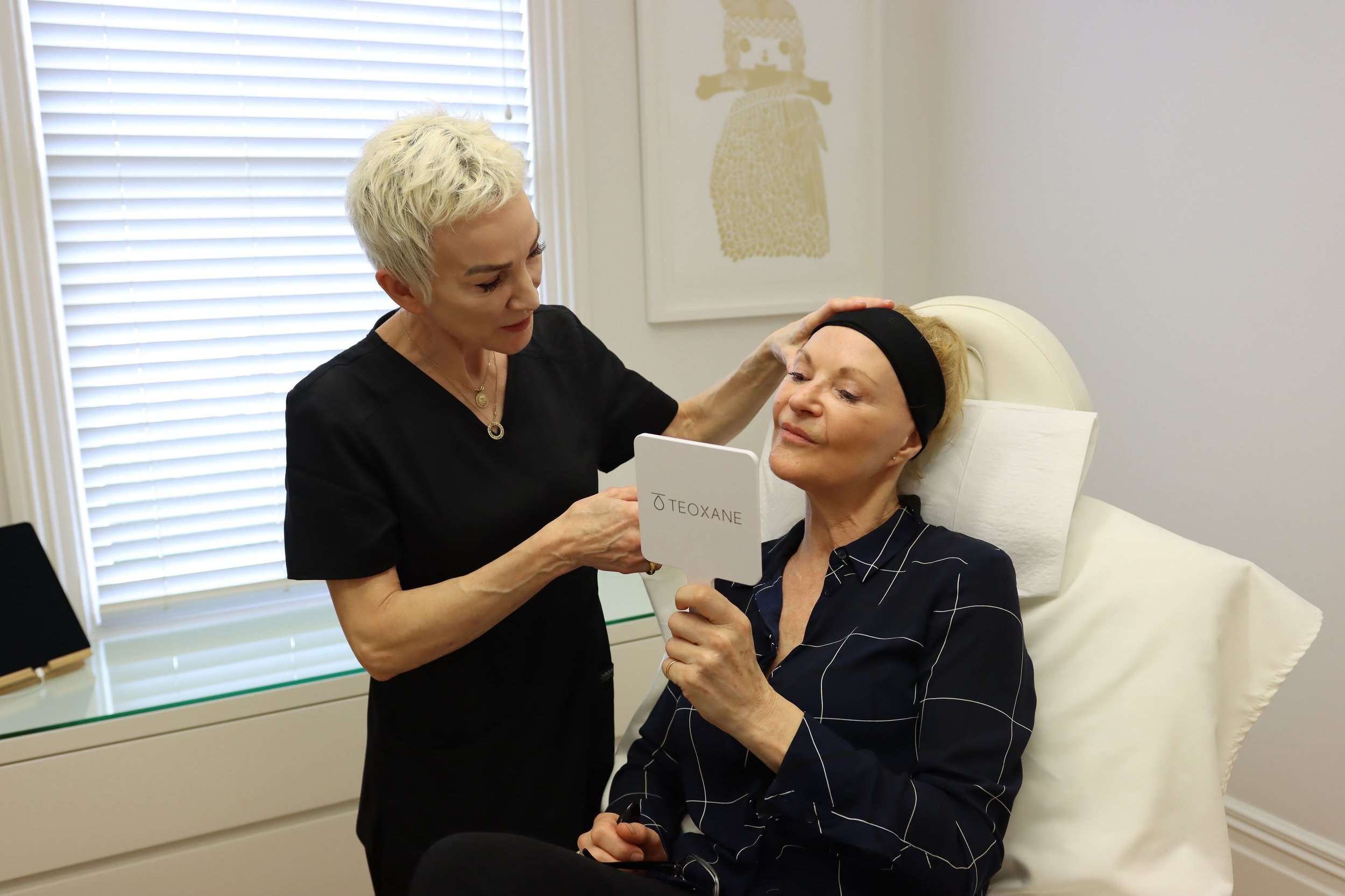 Dr Patti Piper in consultation with a patient at Aesthetica