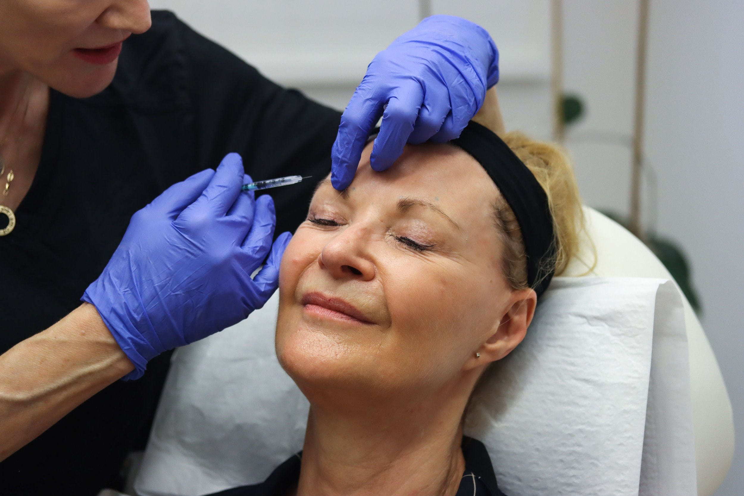 Dr Patti Piper treating a heavy brow at Aesthetica in Grey Lynn